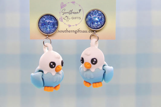 3D Blue Budge Earrings